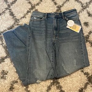 Distressed size 8 mom slim jeans.